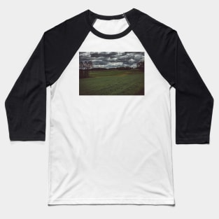 Dark moody sky over meadow and forest Baseball T-Shirt